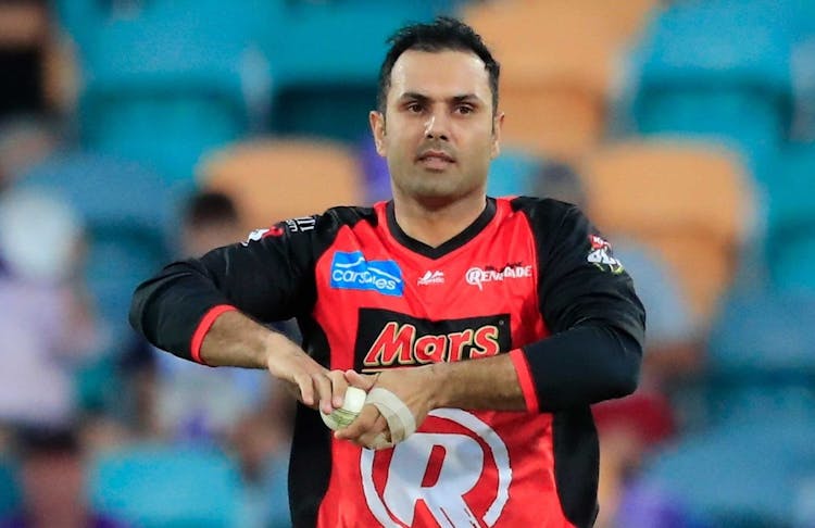 Cricketer Mohammad Nabi holding a cricket ball