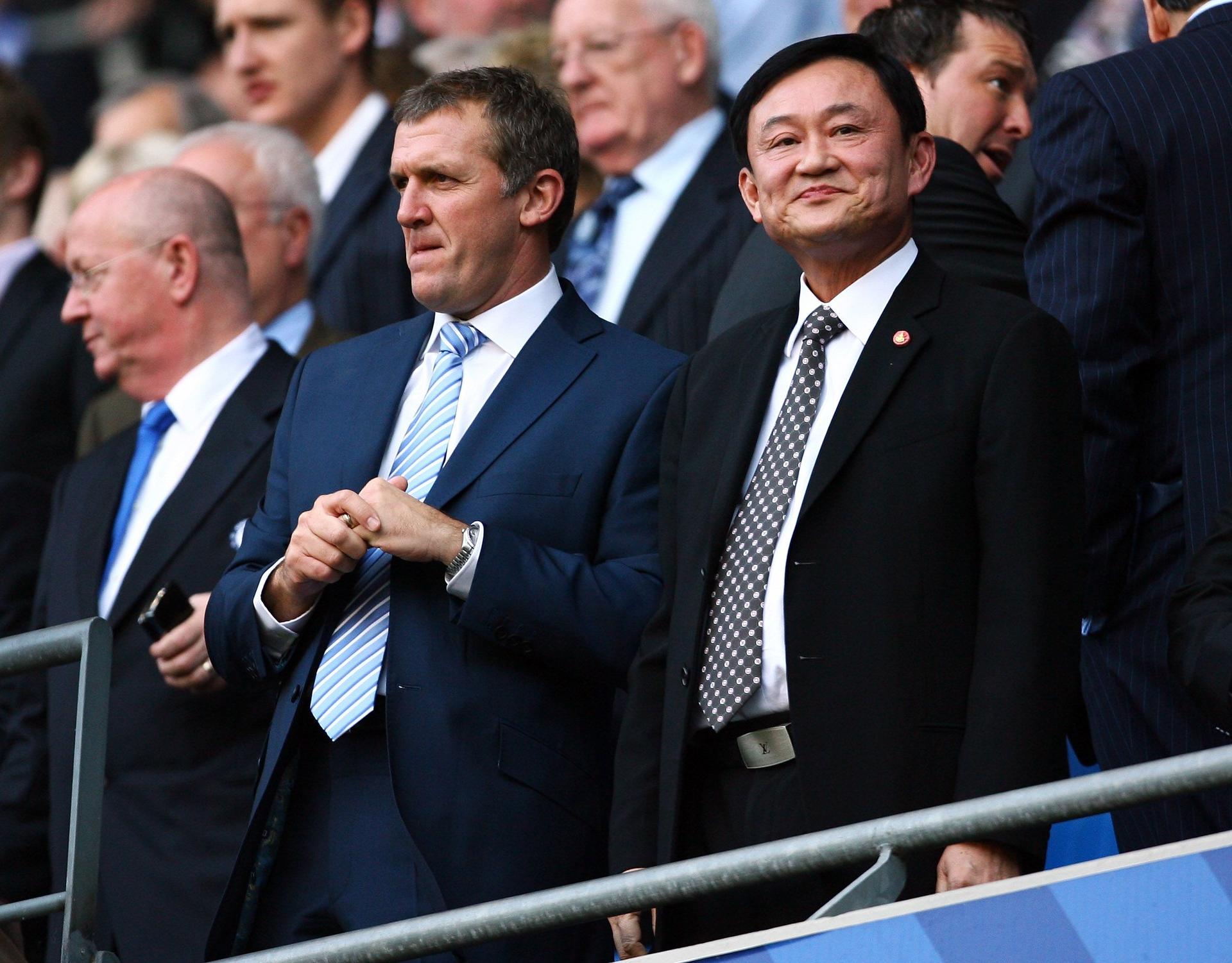 CEO and Owner of Manchester City Garry Cook and  owner Thaksin Shinawatra