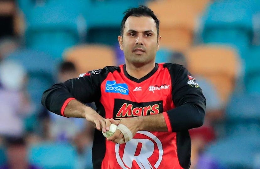 Cricketer Mohammad Nabi holding a cricket ball