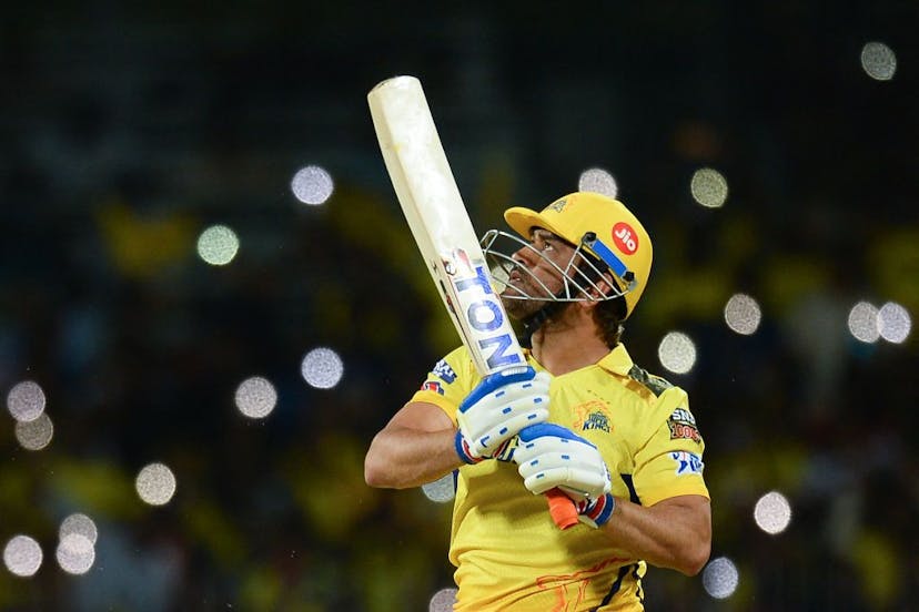 Chennai Super Kings' captain Mahendra Singh Dhoni watches the ball after playing a shot during the Indian Premier League