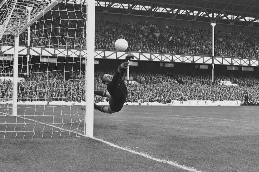 Lev Yashin (1929 - 1990), Goalkeeper for the Soviet Union reaches to make a save during the FIFA World Cup Semi Final match against West Germany