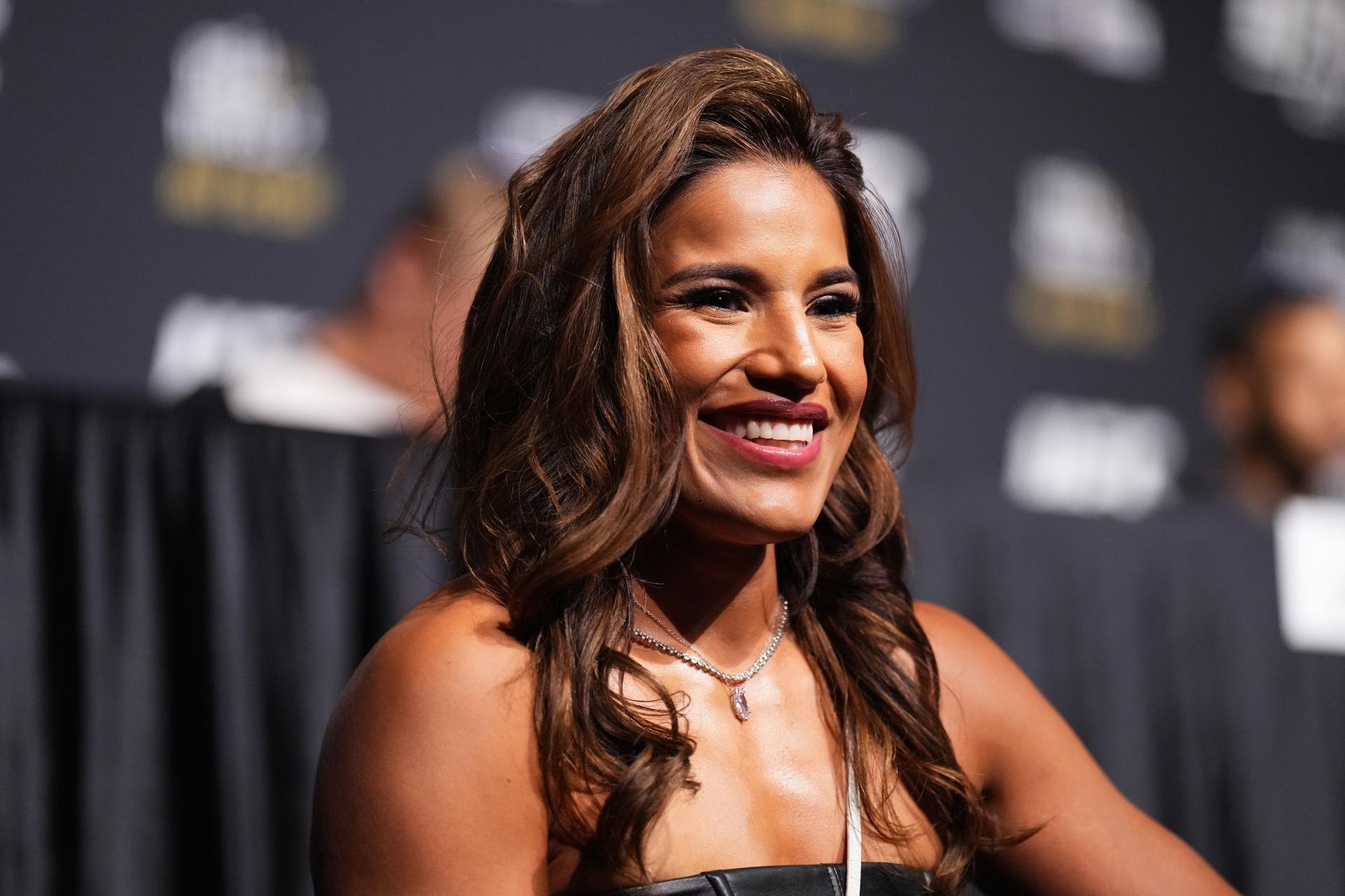 Julianna Pena interacts with media during the UFC 277 