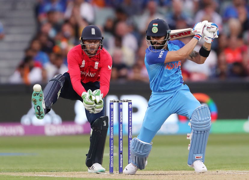  Virat Kohli of India and Jos Buttler of England during the ICC Men's T20 World Cup Semi Final match between India and England 
