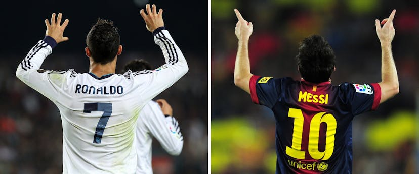  Cristiano Ronaldo (L) and Barcelona's Argentinian forward Lionel Messi