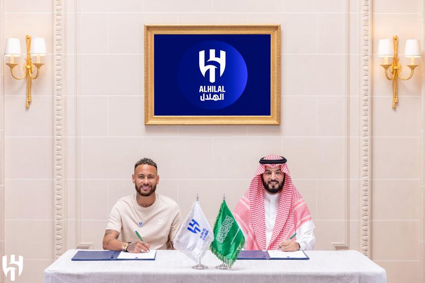 Brazilian football star Neymar (L) and Al-Hilal's president Fahad bin Nafel (R) 