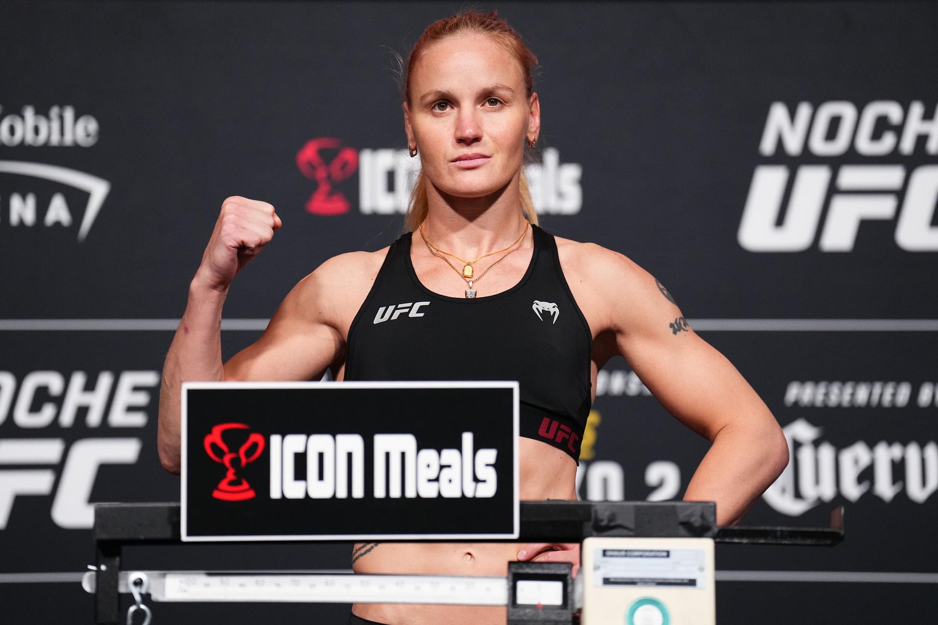 Valentina Shevchenko of Kyrgyzstan poses on the scale during the Noche UFC 