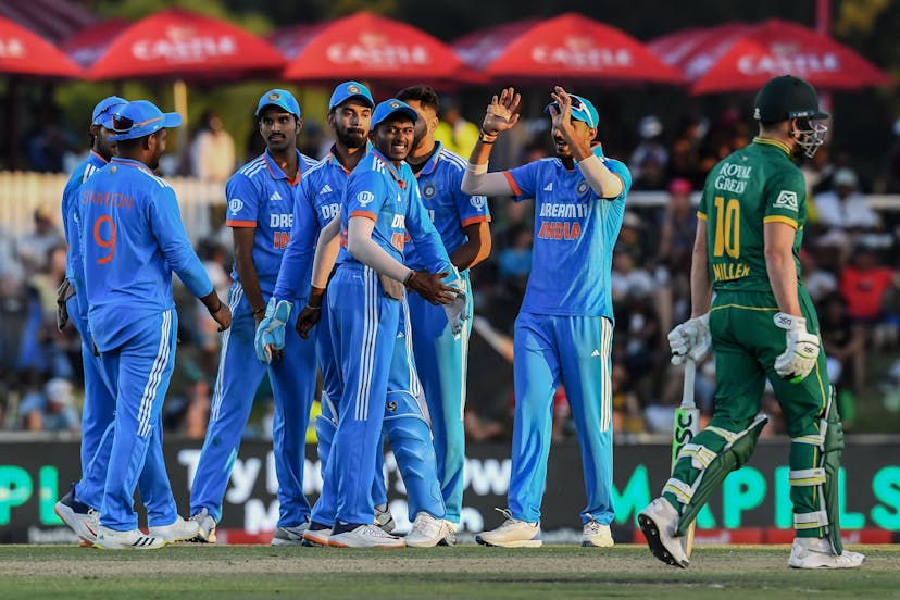 Indian players celebrate following the dismissal of South Africa's Heinrich Klaasen (not seen) during the third one-day international