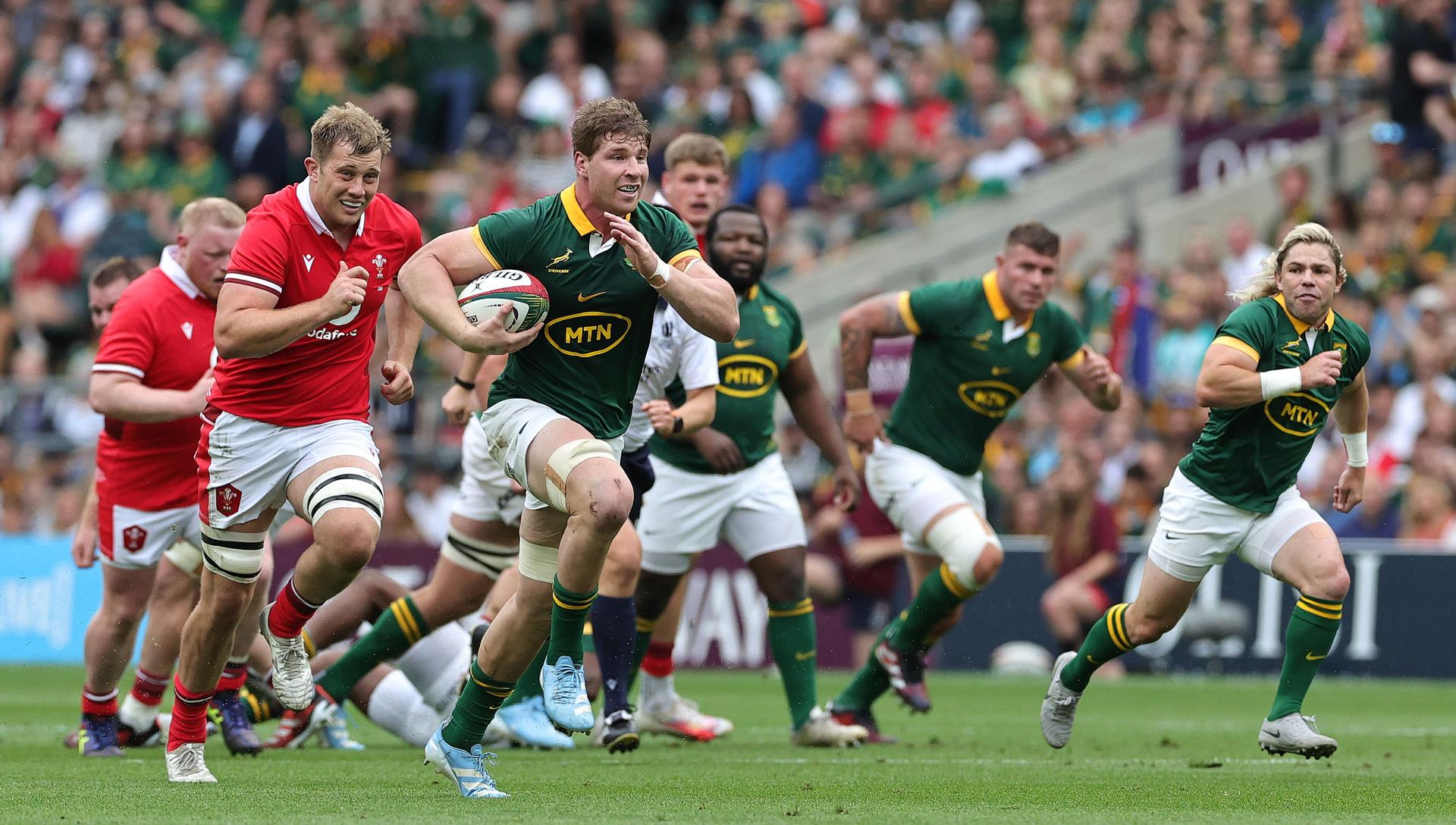 Evan Roos of South Africa runs with the ball during the Summer Rugby International match between South Africa and Wales