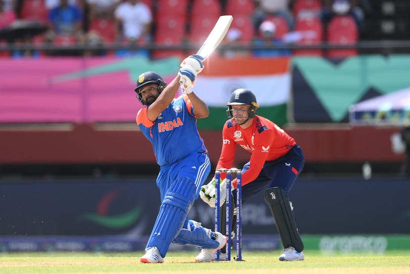 Rohit Sharma of India bats ahead of wicketkeeper Jos Buttler of England during the ICC Men'