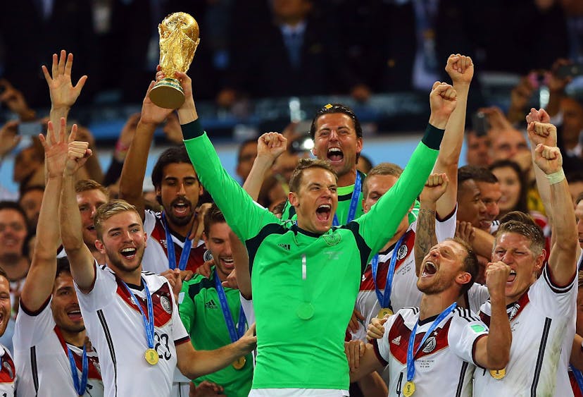 Manuel Neuer of Germany celebrates with World Cup trophy 
