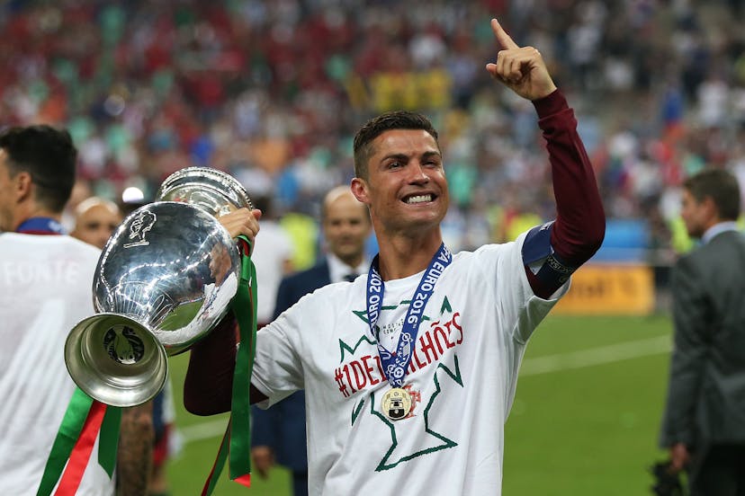  Cristiano Ronaldo of Portugal celebrates with the trophy following the UEFA Euro 2016 Final 