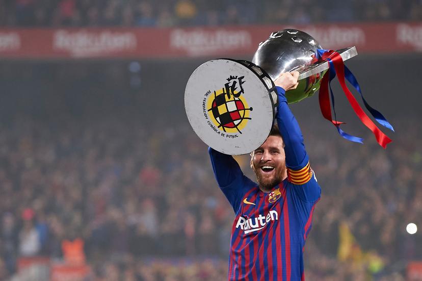 Lionel Messi of Barcelona celebrates after Barcelona won their 26th league title