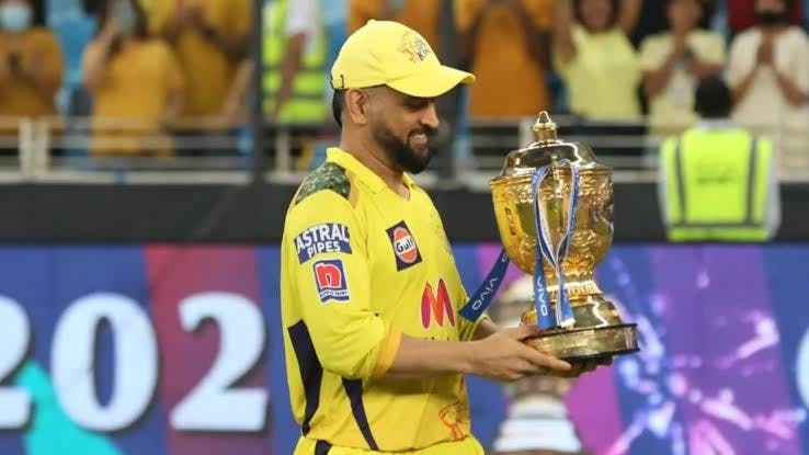 MS Dhoni with IPL Trophy for CSK.jpeg
