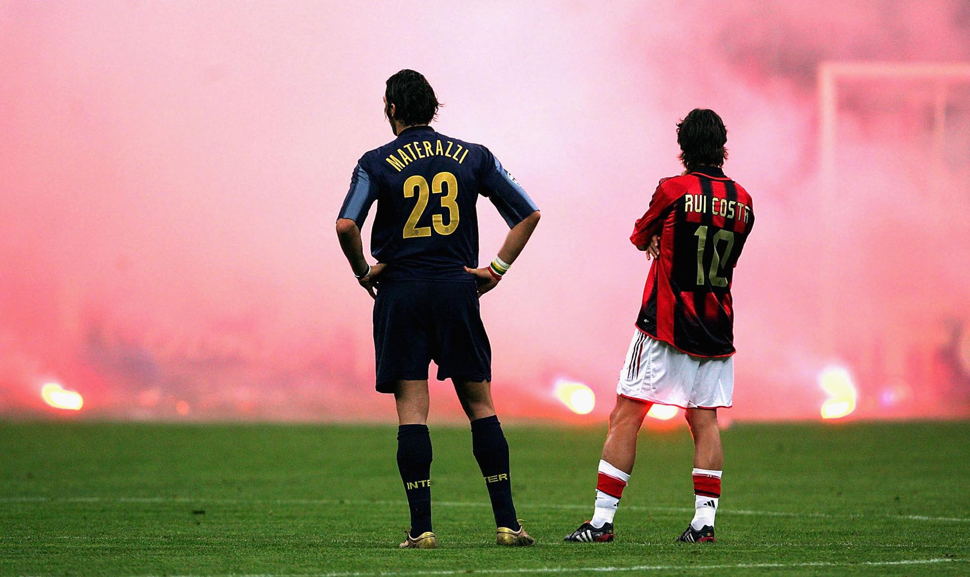 Marco Materazzi of Inter Milan and Rui Costa of AC Milan