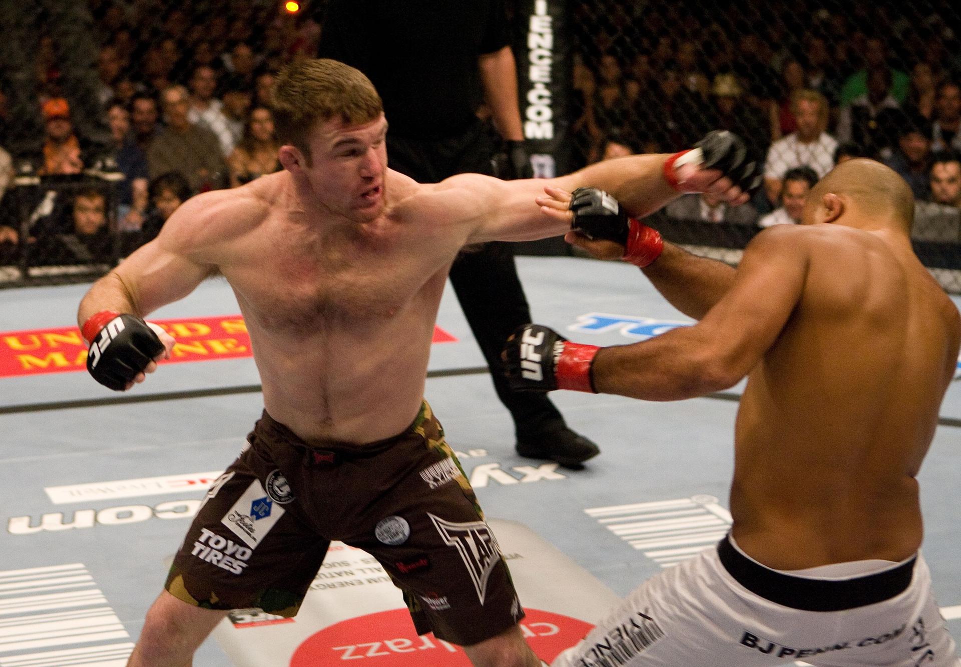 Matt Hughes punches BJ Penn at UFC 63 at the Arrowhead Pond 