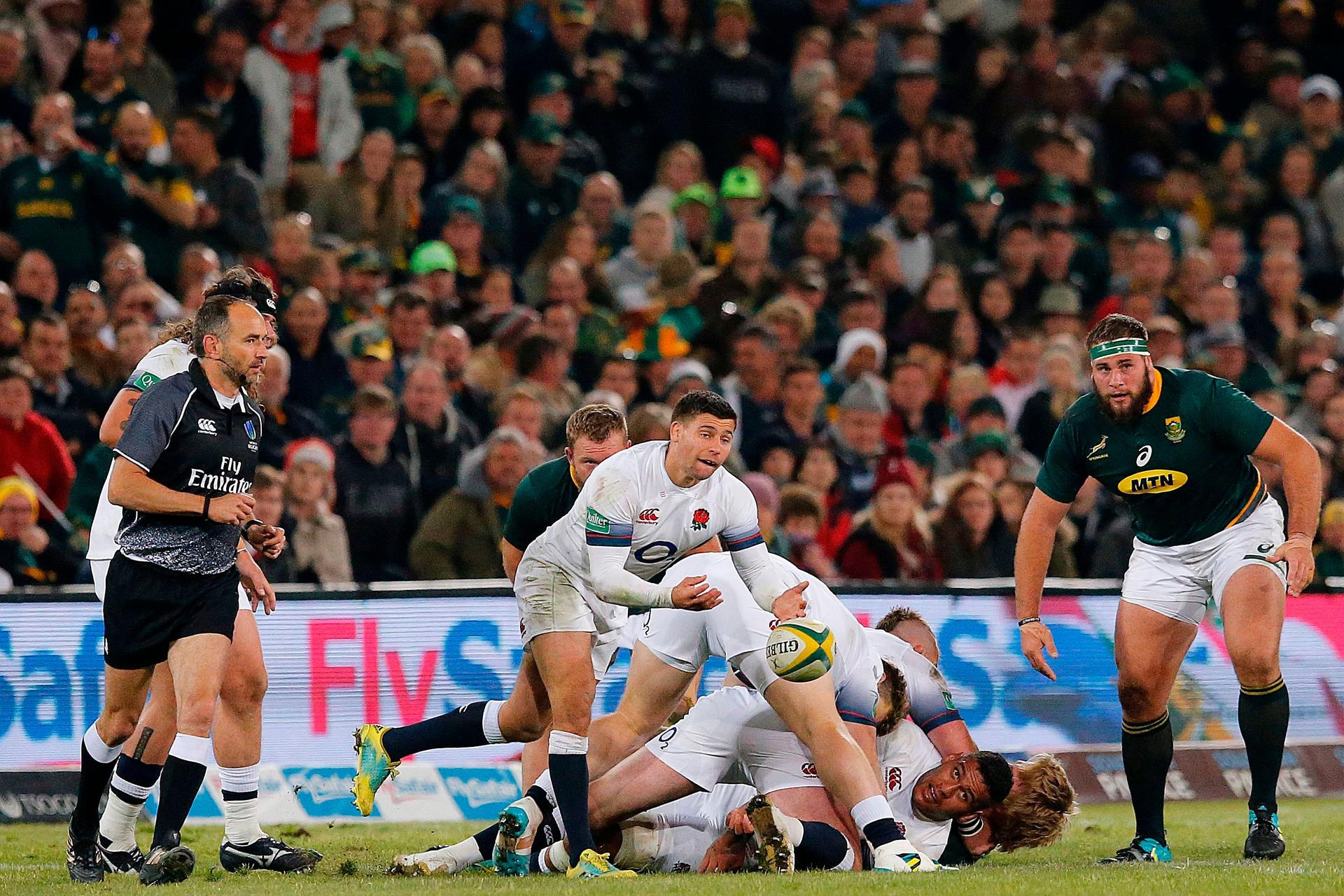 England scrum-half Ben Youngs clears the ball from a ruck as England's prop Mako Vunipola