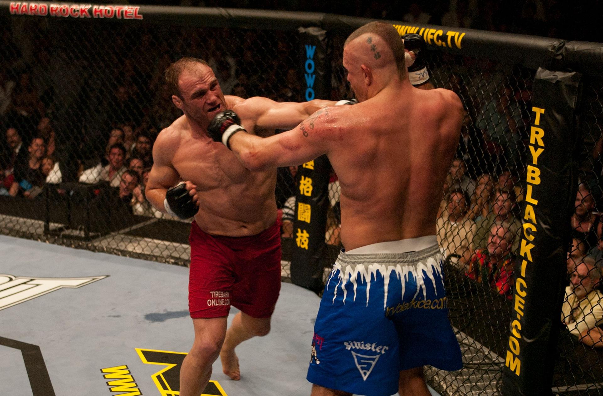 Randy Couture punches Chuck Liddell 