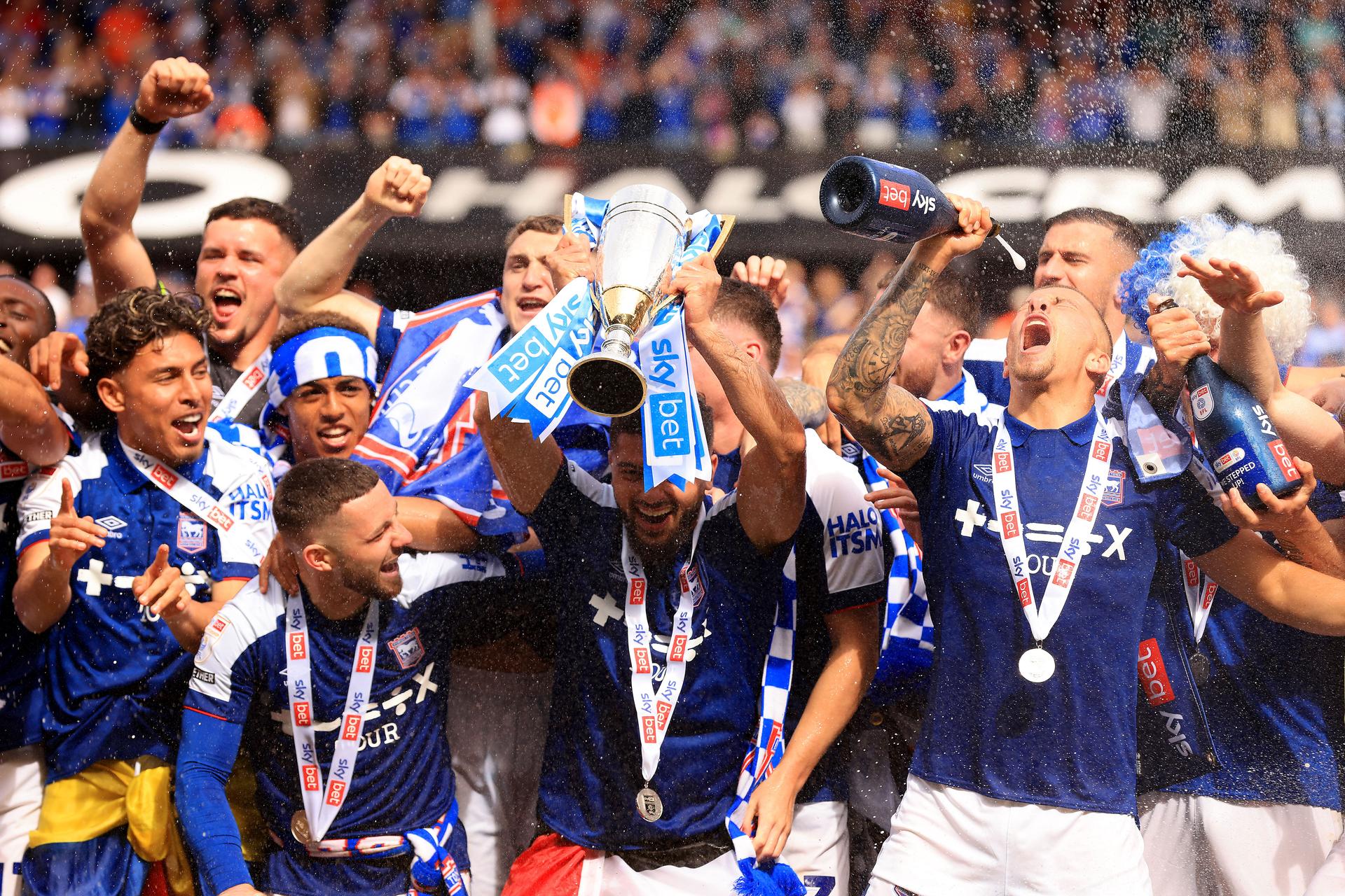 Sam Morsy and team celebrates with the trophy