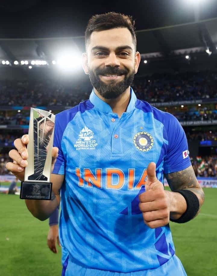 Virat Kohli With Player of the Match Trophy in T20.jpeg