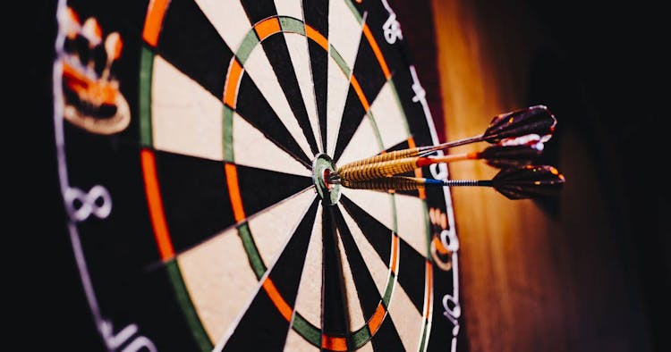 two darts on a bullseye 