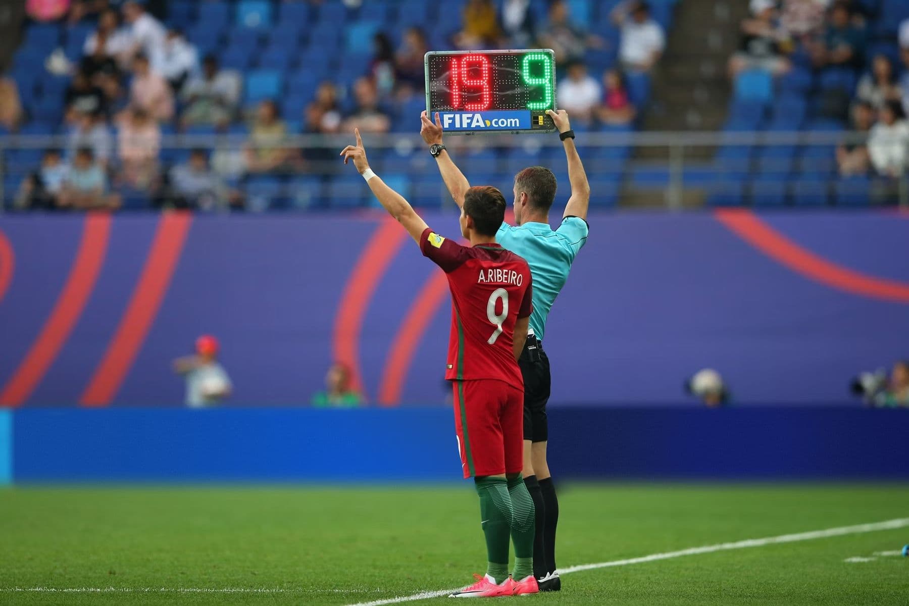 Portugese national football player Ribeiro being substituted on during a match