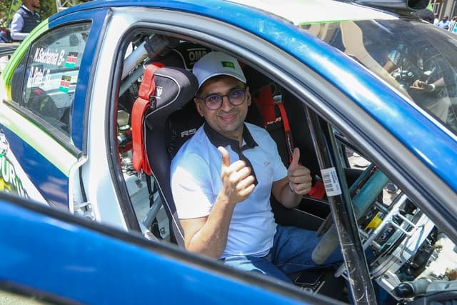 Rally driver Nikhil Sachania sitting in his own rally car 