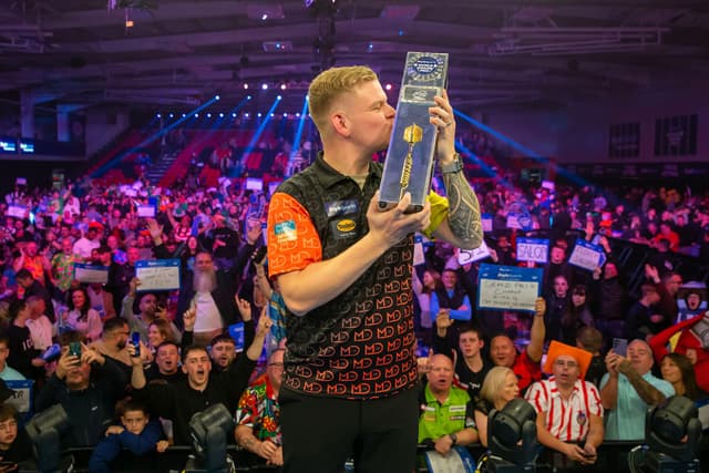 Is the Premier League Calling for New World Grand Prix Champion Mike De Decker?