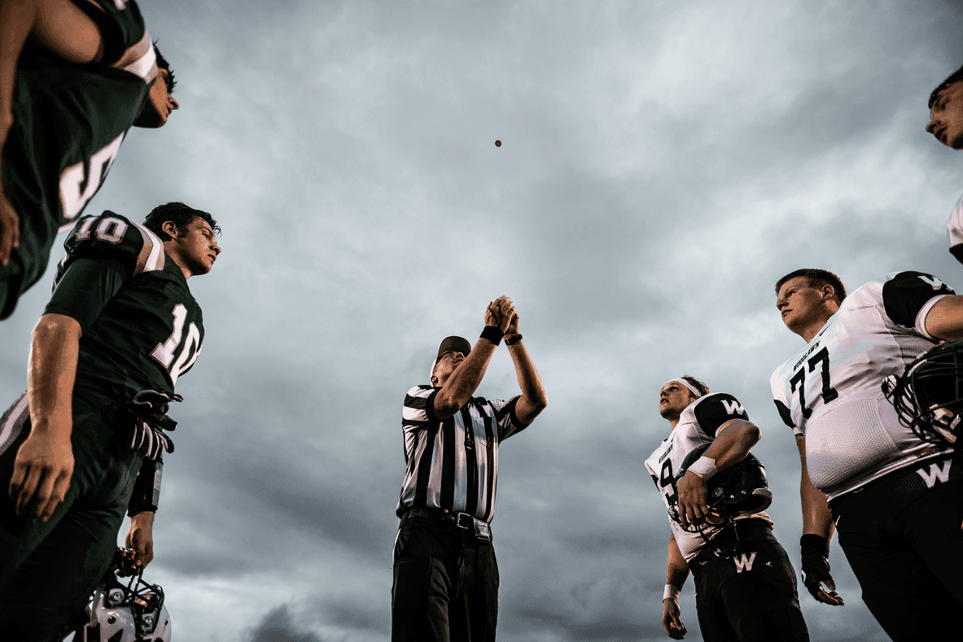 referee tossing a coin