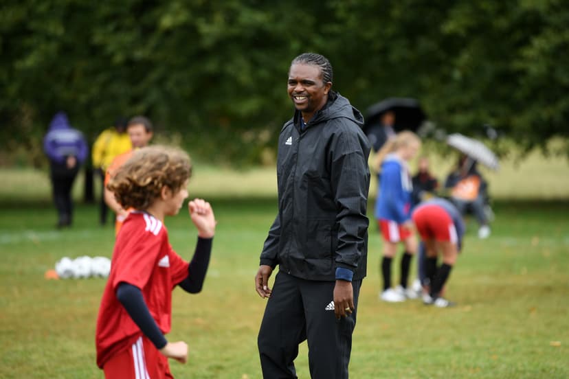  Nwankwo Kanu looks on as kids participates 