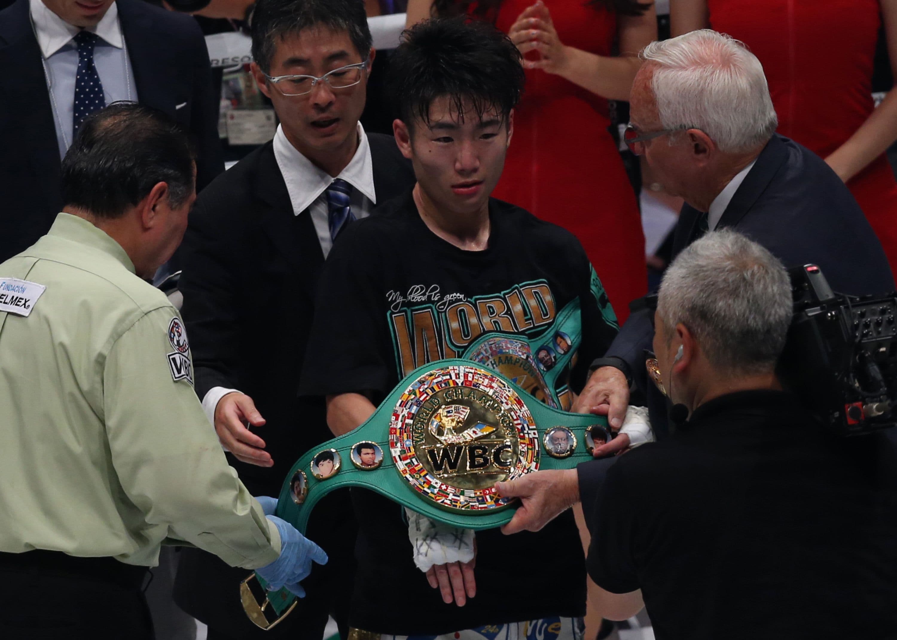 Kenshiro Teraji of Japan receives his champion belt