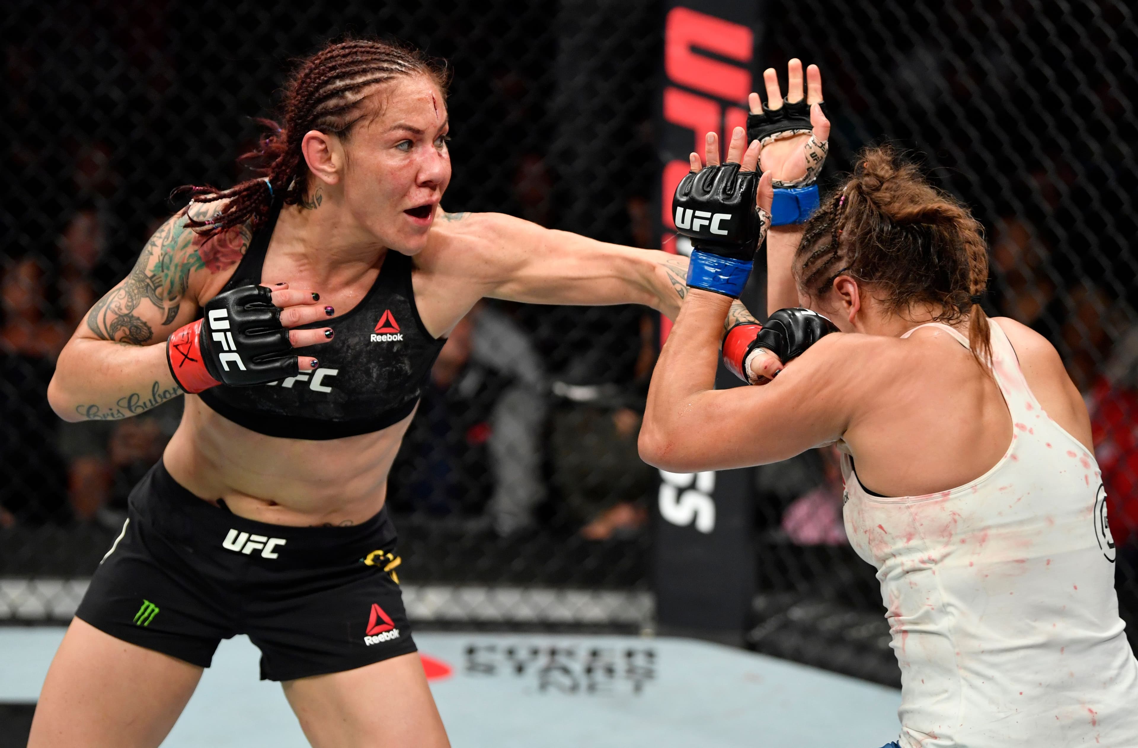 Cris Cyborg of Brazil punches Felicia Spencer 