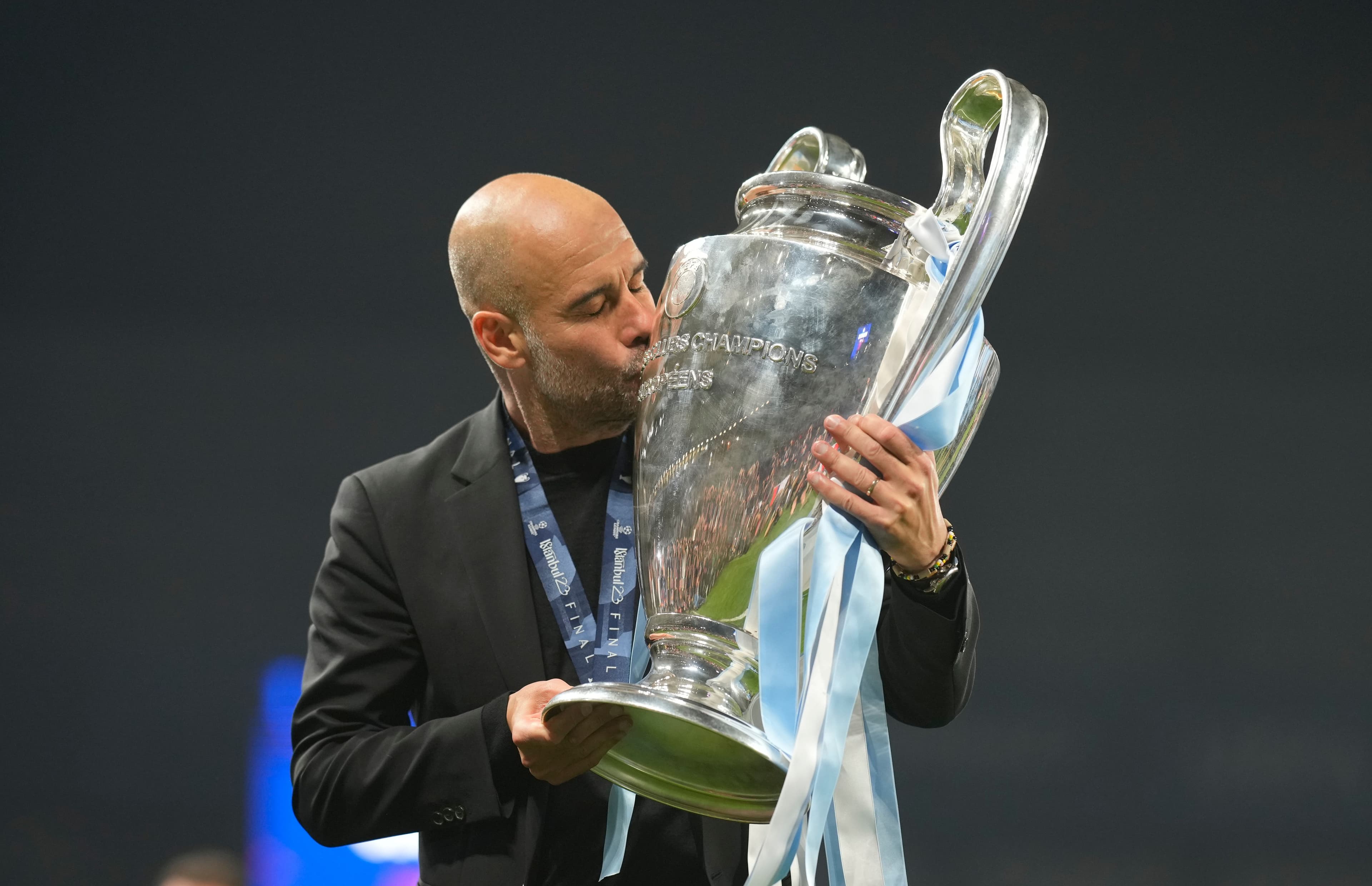 head coach Pep Guardiola of Manchester City poses 