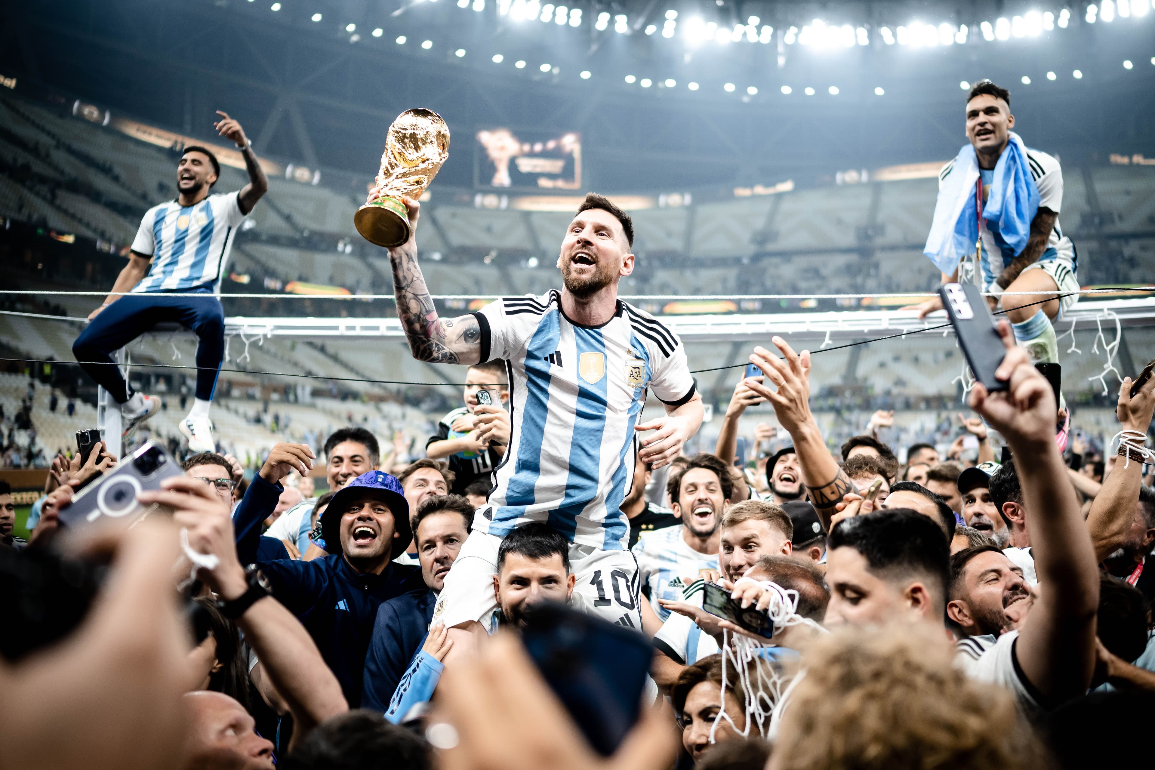 Messi Celebrating with FIFA world Cup