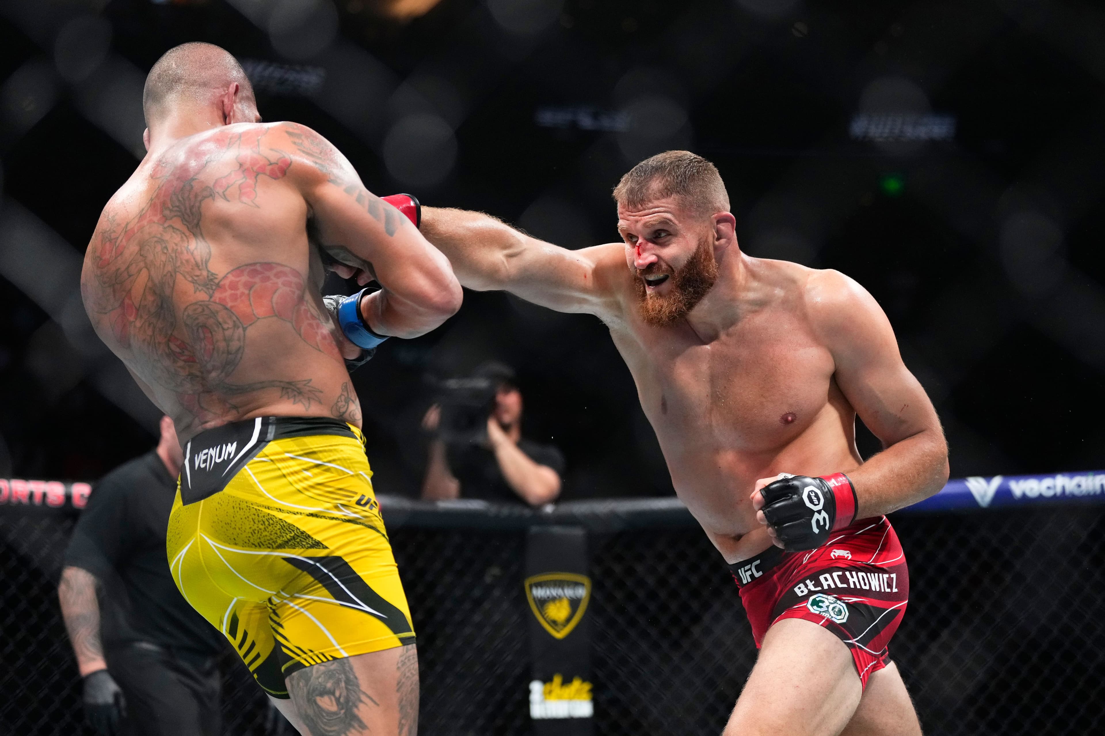 Jan Blachowicz of Poland punches Alex Pereira of Brazil