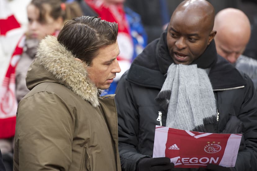 player Martijn Reuser of Ajax, former player Finidi George of Ajax 