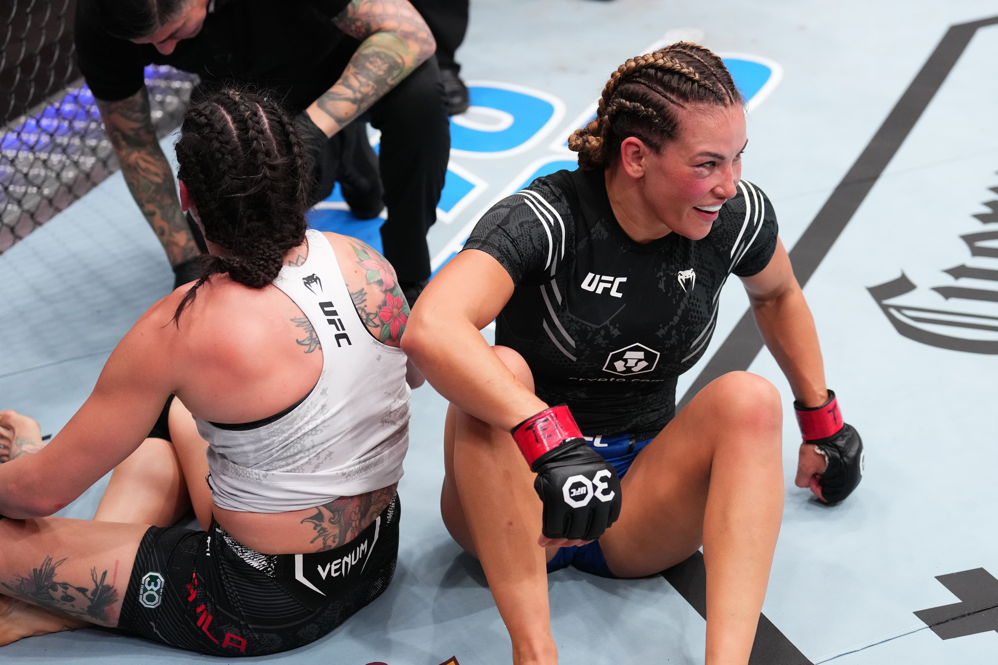 Miesha Tate reacts after her submission victory 