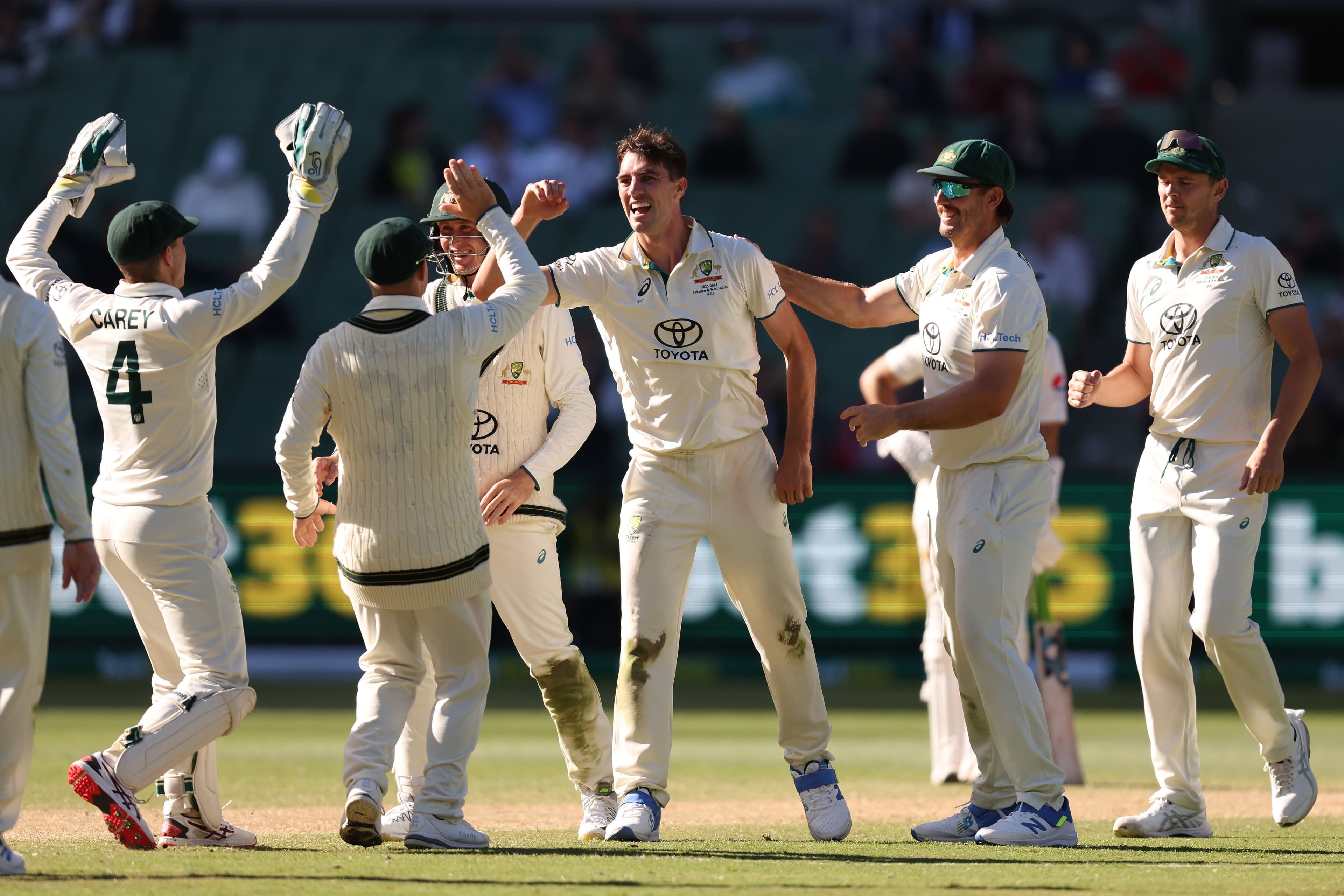 Pat Cummins of Australia celebrates the wicket of Aamer Jamal of Pakistan during day 