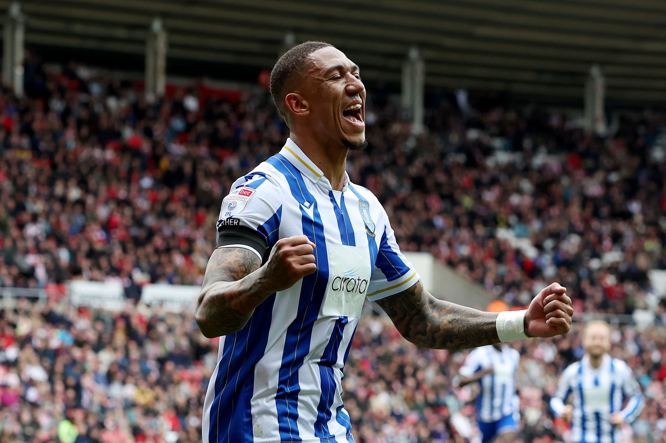 Liam Palmer of Sheffield Wednesday celebrates scoring his team's first goal 