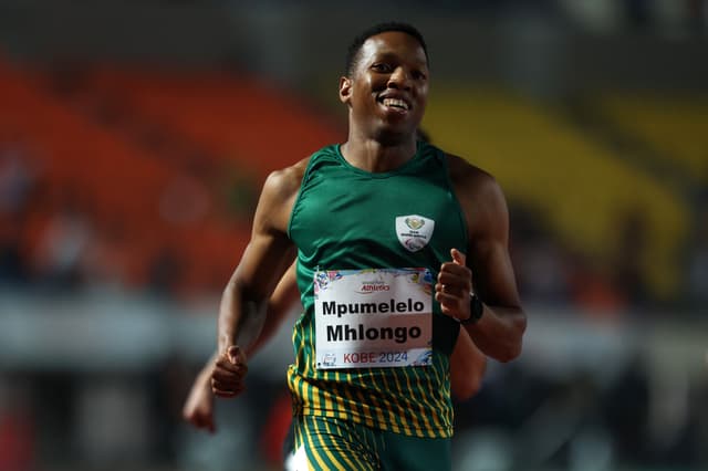 Mpumelelo Mhlongo of South Africa celebrates winning the gold medal 