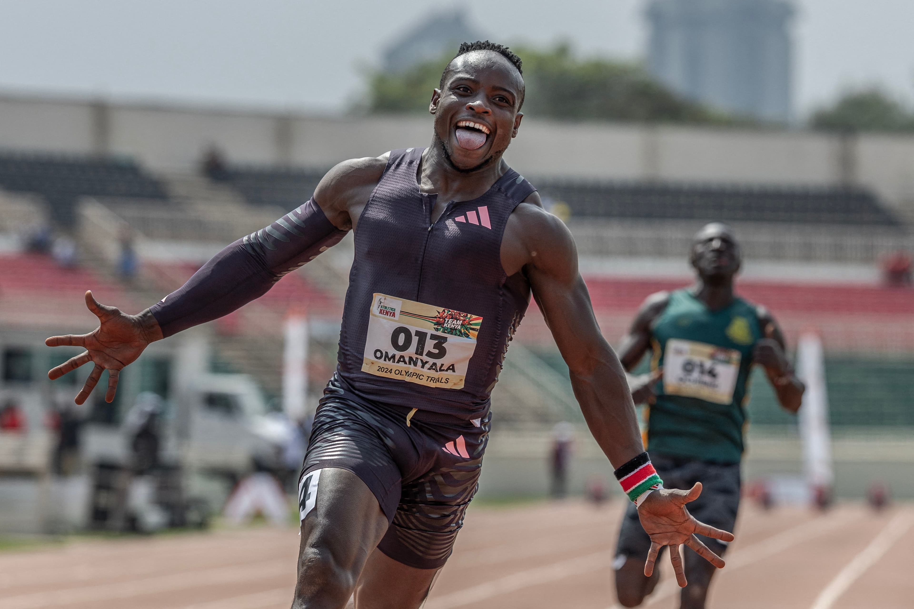 Kenyan 100m African record holder Ferdinand Omanyala reacts after winning the 100m Men Final