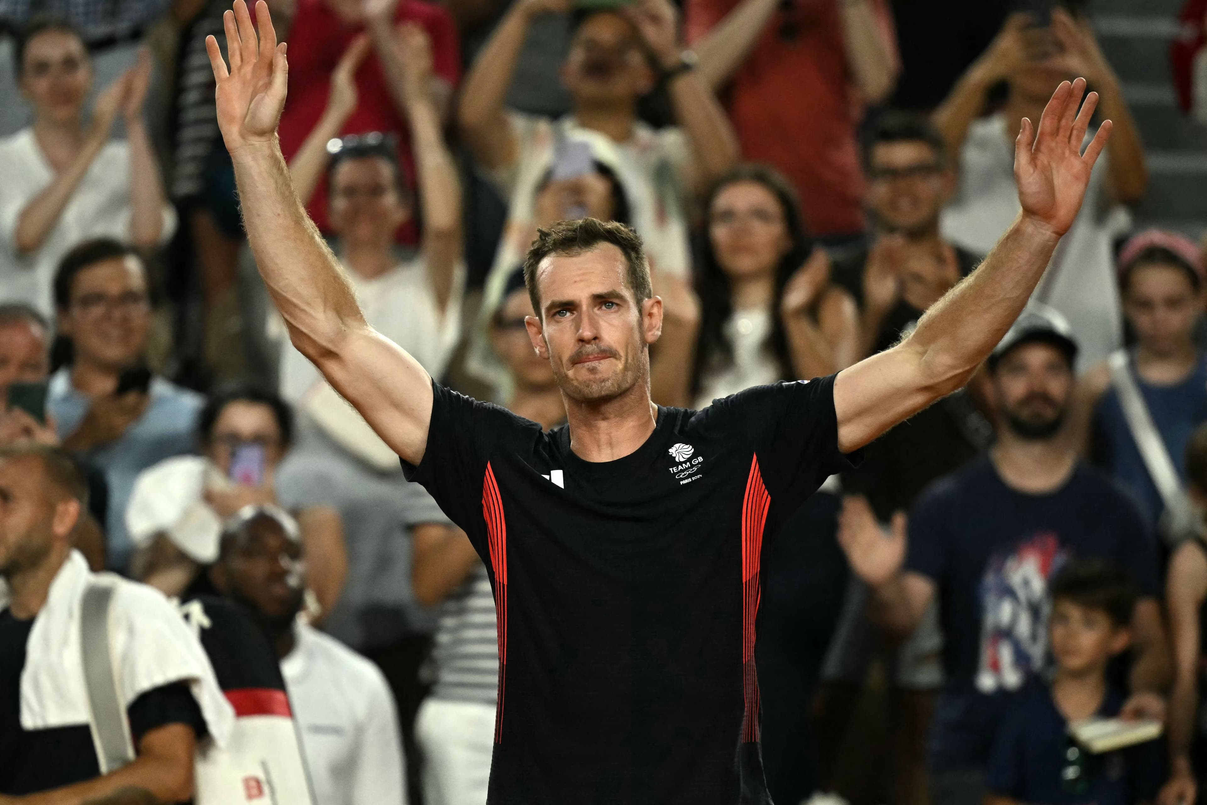 Britain's Andy Murray waves goodbye 