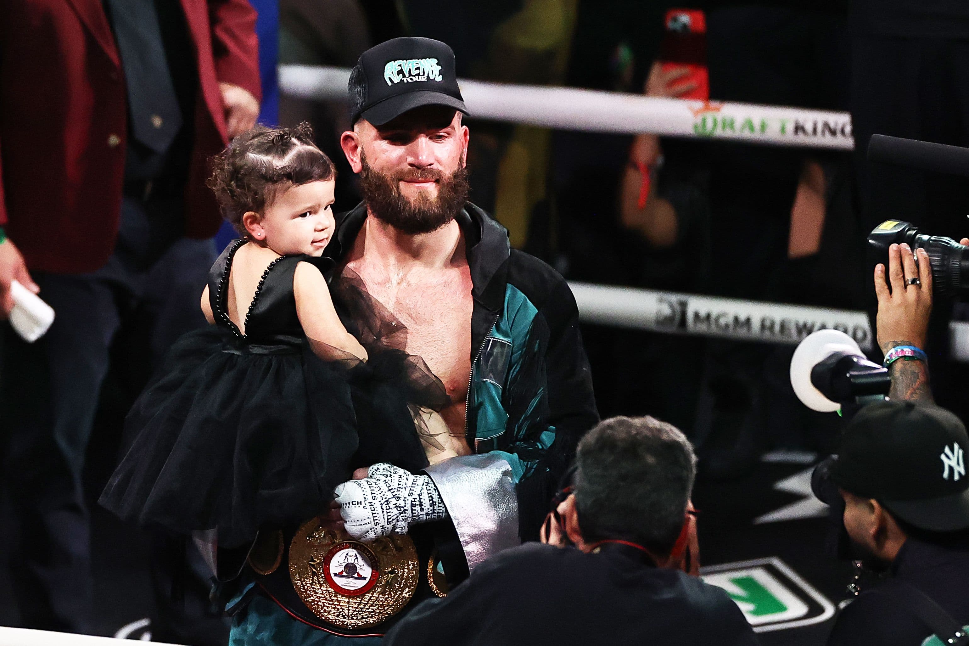 Boxer Caleb Plant celebrates his win 