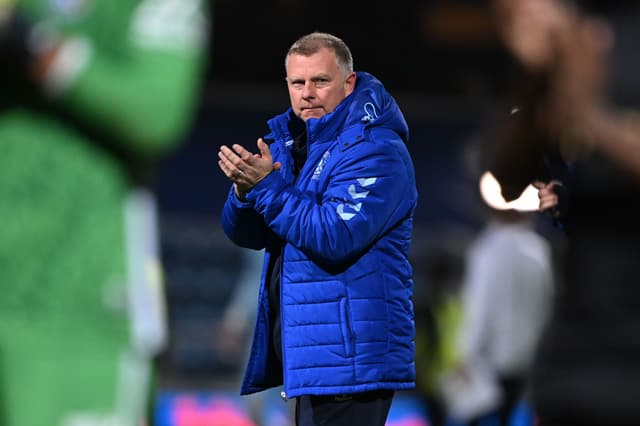 Coventry manager Mark Robins applauds the Coventry fans 