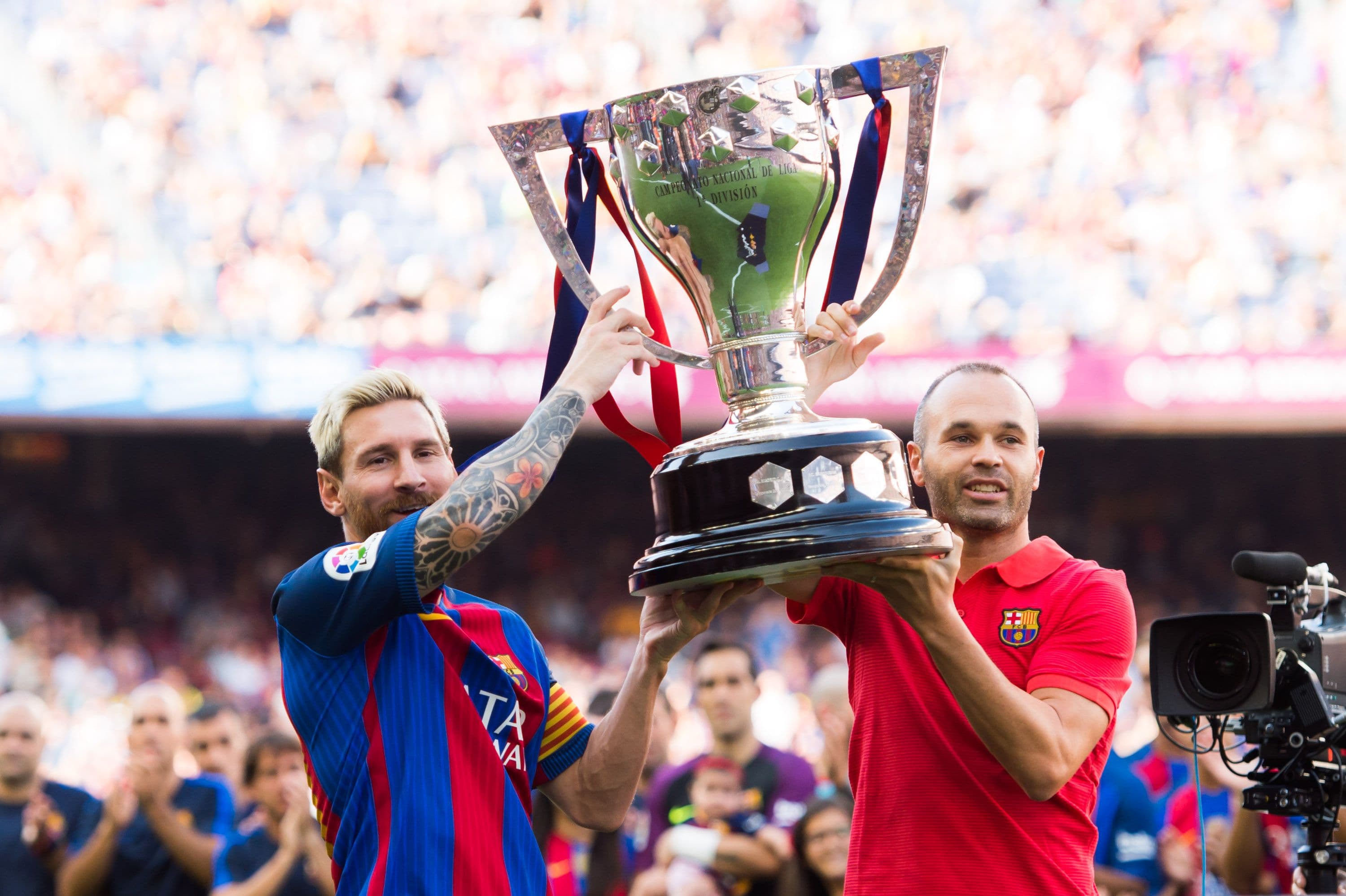 Lionel Messi (L) and Andres Iniesta (R) of FC Barcelona 