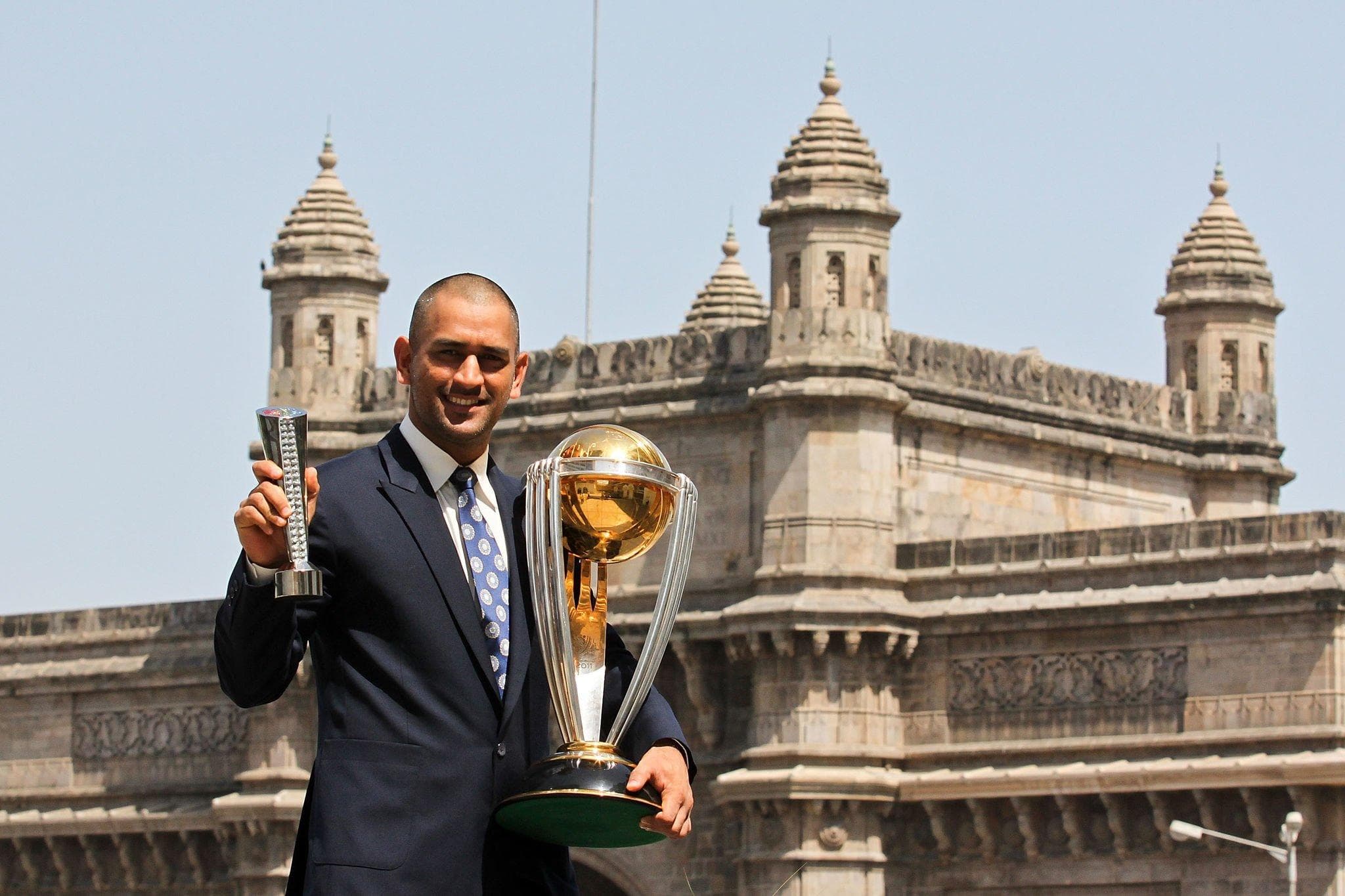 MS Dhoni with 2011 World Cup Trophy.jpeg