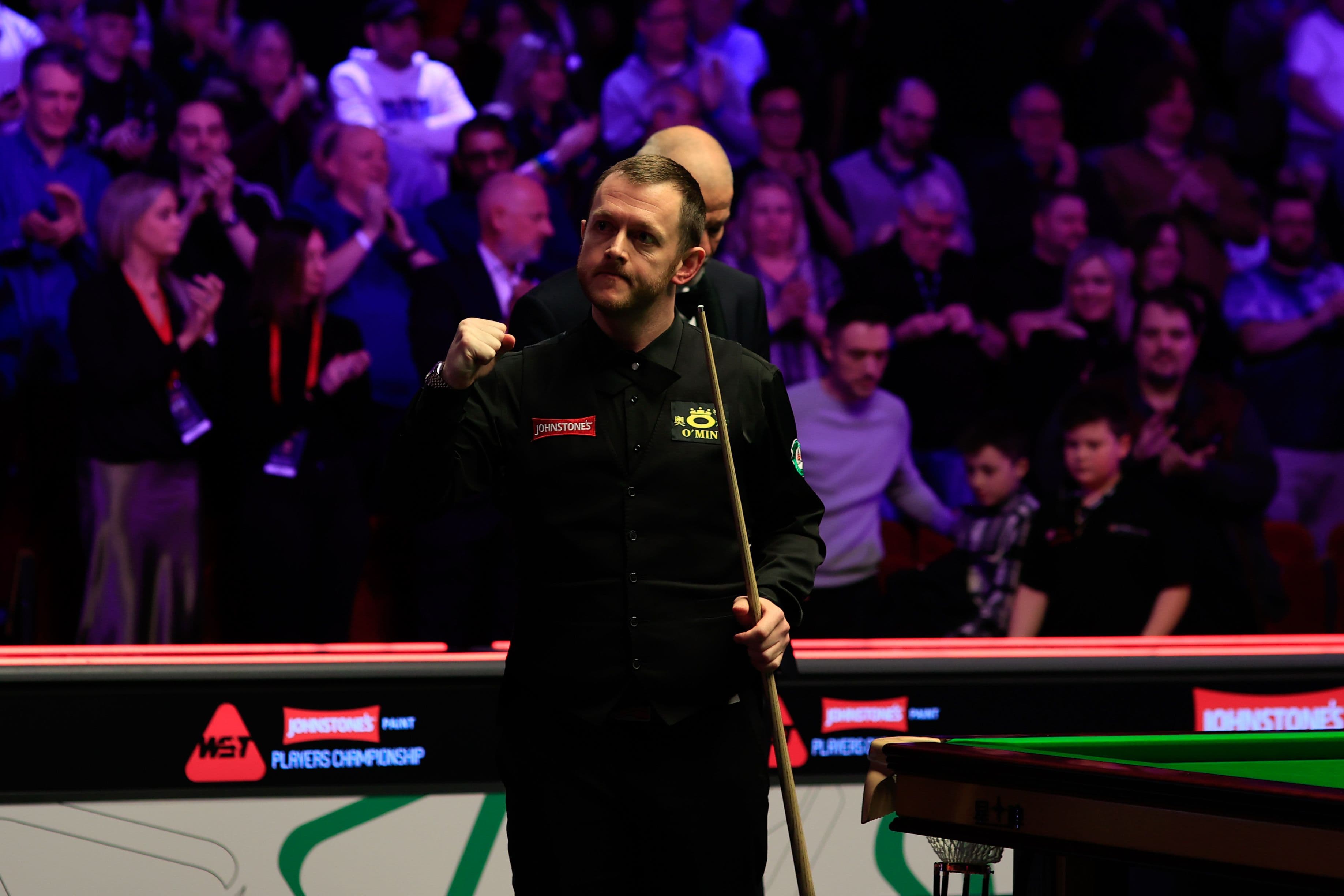 Mark Allen celebrates his 10-8 win against Zhang Anda