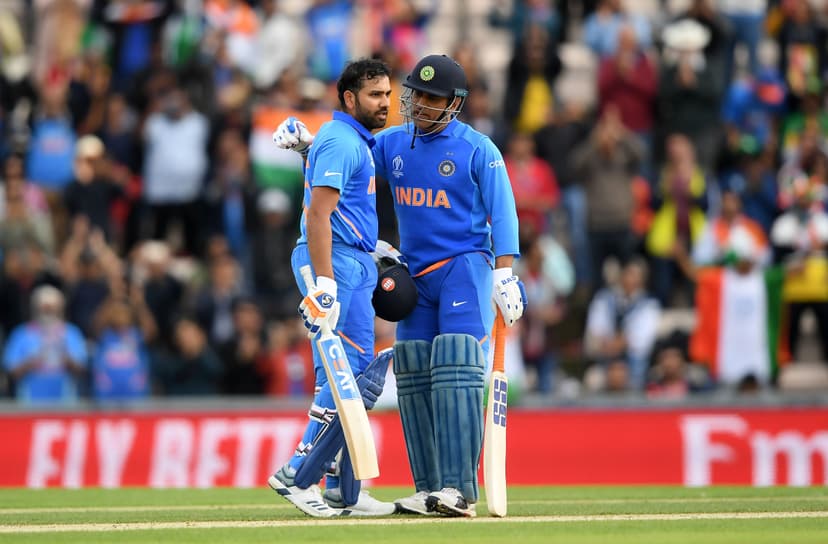 Rohit Sharma celebrating his century with MS Dhoni