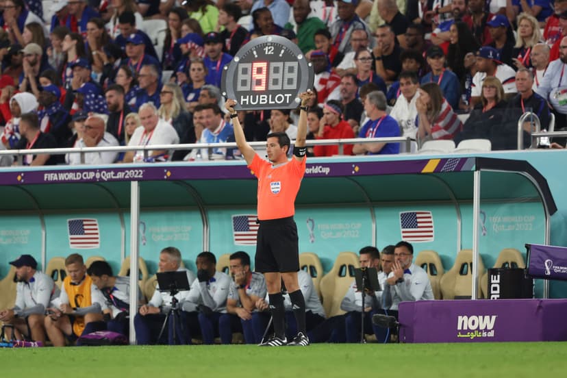 The Assistant Referee signals nine minutes of added on time during the FIFA World Cup Qatar 2022.jpg