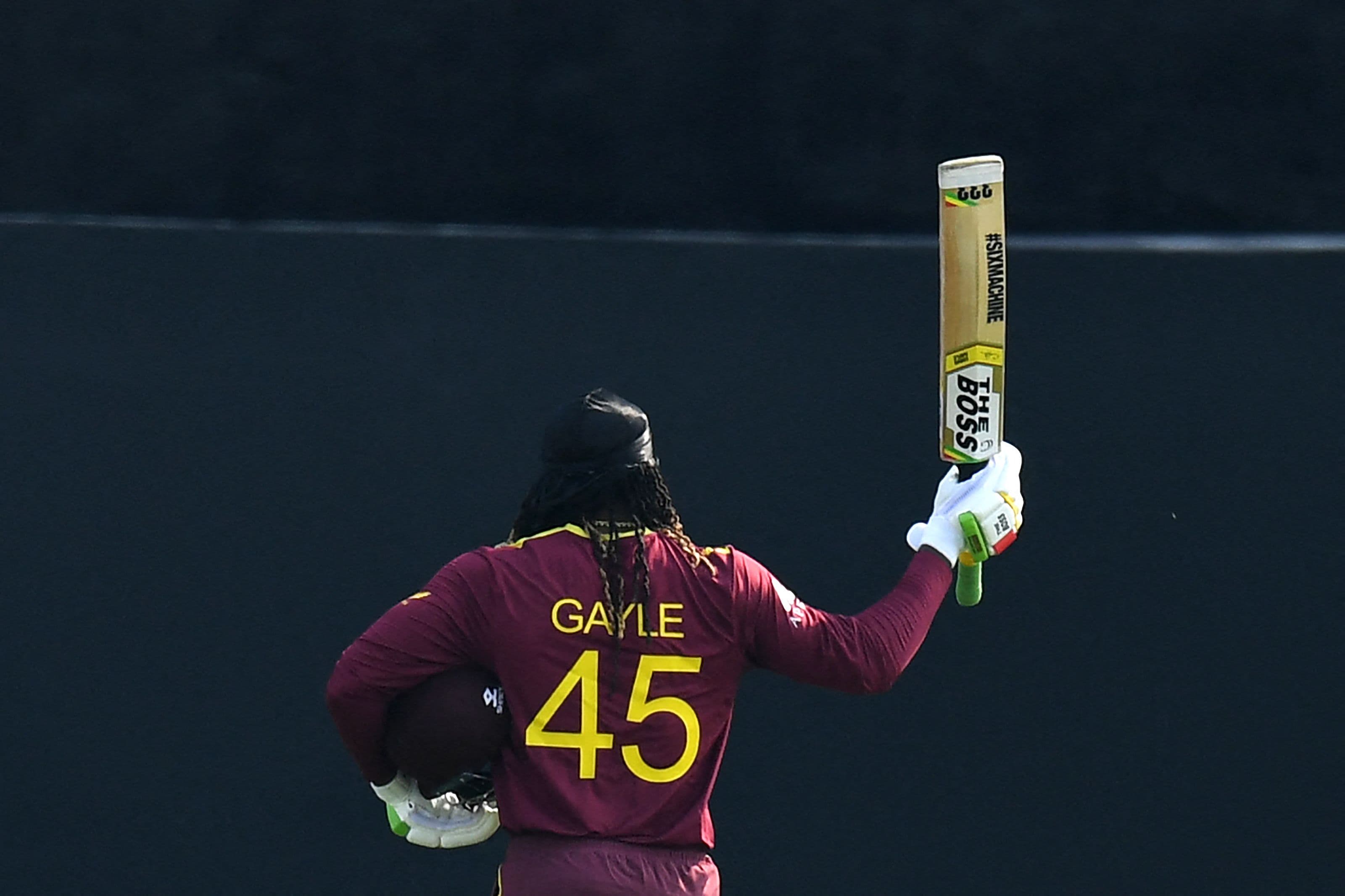 West Indies' Chris Gayle gestures as he walks back to the pavilion 