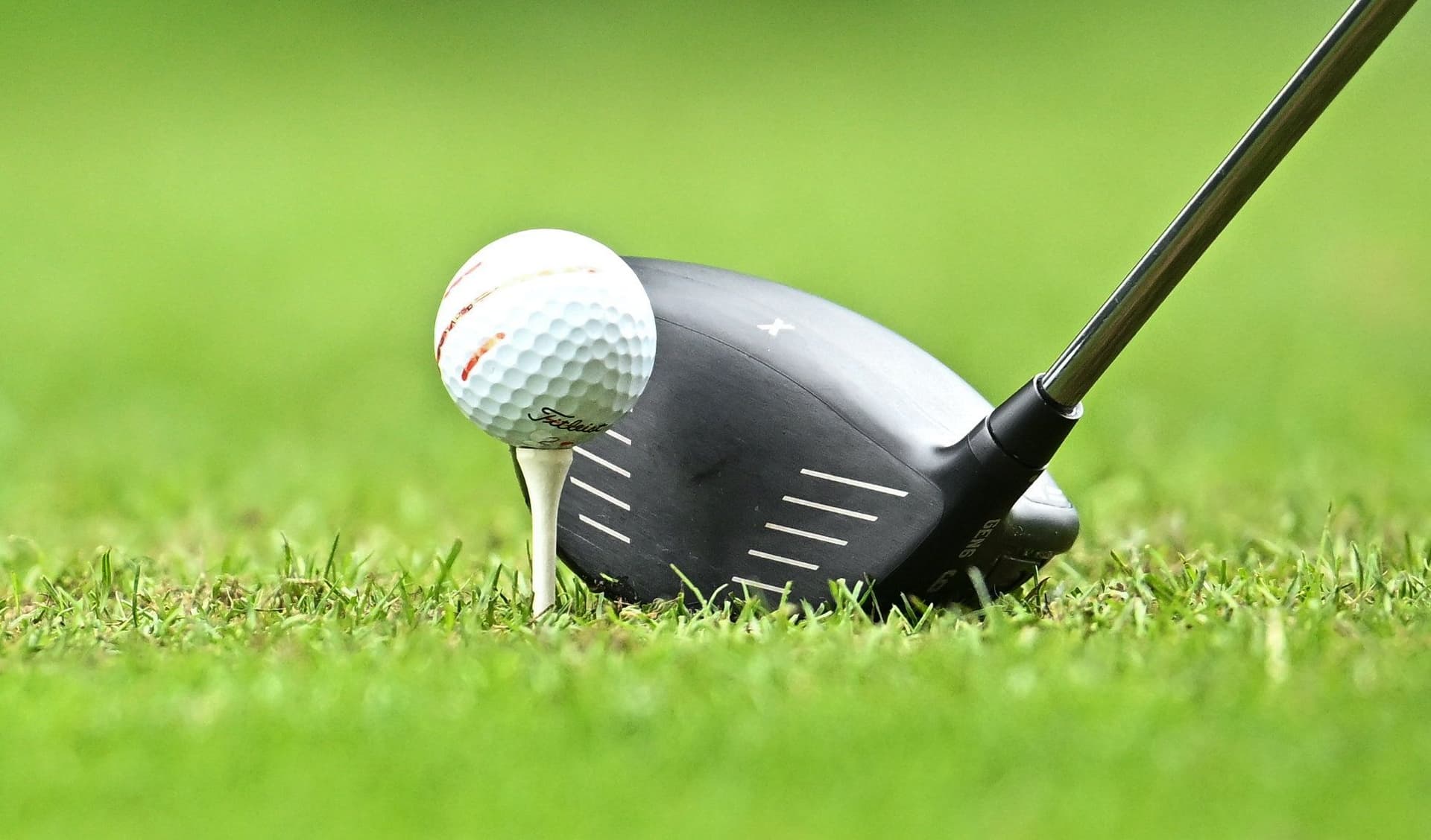 A general view of a Titleist golf ball and driver